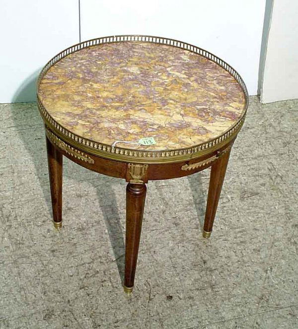 EMPIRE STYLE WALNUT MARBLE TOP GUERIDON, circa 194: EMPIRE STYLE WALNUT MARBLE TOP GUERIDON, circa 1940, of cocktail table height, having a reticulated brass gallery, superbly figured marble top, the apron with bronze mounts, supported on circular, wai
