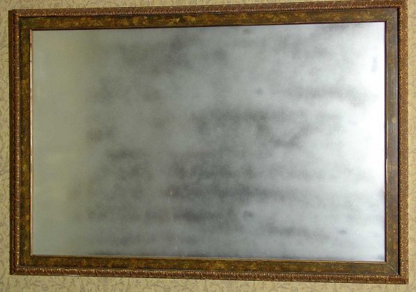 LARGE DISTRESSED FINISH RECTANGULAR WALL MIRROR, h: LARGE DISTRESSED FINISH RECTANGULAR WALL MIRROR, having a tortoise shell and gilded decoration; 54-1/2 inches by 37-1/2 inches (Est. 300-400)