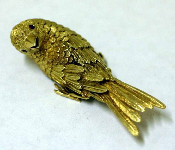 FINE ERWIN PEARL 18 KT. YELLOW GOLD FIGURAL BROOC: FINE ERWIN PEARL 18 KT. YELLOW GOLD FIGURAL BROOCH, signed, modeled as a bird with ruby eyes, the rubies totaling approximately .05 cts.; 2-1/4 inch height, accompanied by a letter of authenticity (Es