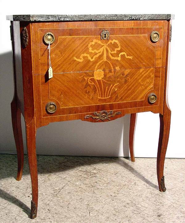LOUIS XV/XVI TRANSITIONAL STYLE MARQUETRY INLAID R: LOUIS XV/XVI TRANSITIONAL STYLE MARQUETRY INLAID ROSEWOOD AND MAHOGANY TWO-DRAWER MARBLE TOP COMMODE, circa 1900-1920, having canted corners, the floral marquetry front design depicting a basket of fl