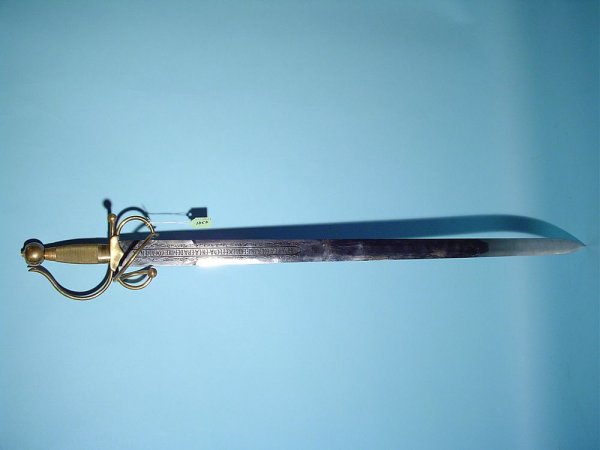 GOOD MUSEUM QUALITY REPLICA OF A SPANISH LONG SWO: GOOD MUSEUM QUALITY REPLICA OF A SPANISH LONG SWORD OF EL CID, this well-crafted sword features a heavy polished brass hilt and handguard, the good Spanish steel blade has foliate and Spanish language