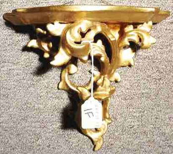 SMALL GILTWOOD WALL BRACKET: SMALL GILTWOOD WALL BRACKET, first half 20th century, in the baroque inspiration, having foliate detailing; 9 inch height; 10 inch width (Est. 50-75)