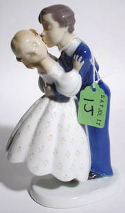 DECORATED PORCELAIN FIGURAL GROUP: DECORATED PORCELAIN FIGURAL GROUP, by B & G, depicting a young boy kissing a young girl; 7-1/4 inch height (Est. 75-125) PROVENANCE: Estate of Chester Weber, Beaumont, Texas