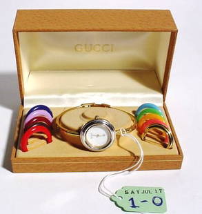 LADY'S GUCCI WRISTWATCH IN CASE WITH INTERCHANGABLE: LADY'S GUCCI WRISTWATCH IN CASE WITH INTERCHANGABLE BEZELS (Est. 25-35) PROVENANCE: Jenny Asby Webb, Houston, Texas