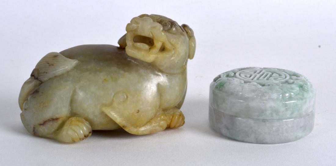 A CHINESE CARVED JADE FIGURE OF A RECUMBANT BEAST (1 of 2)