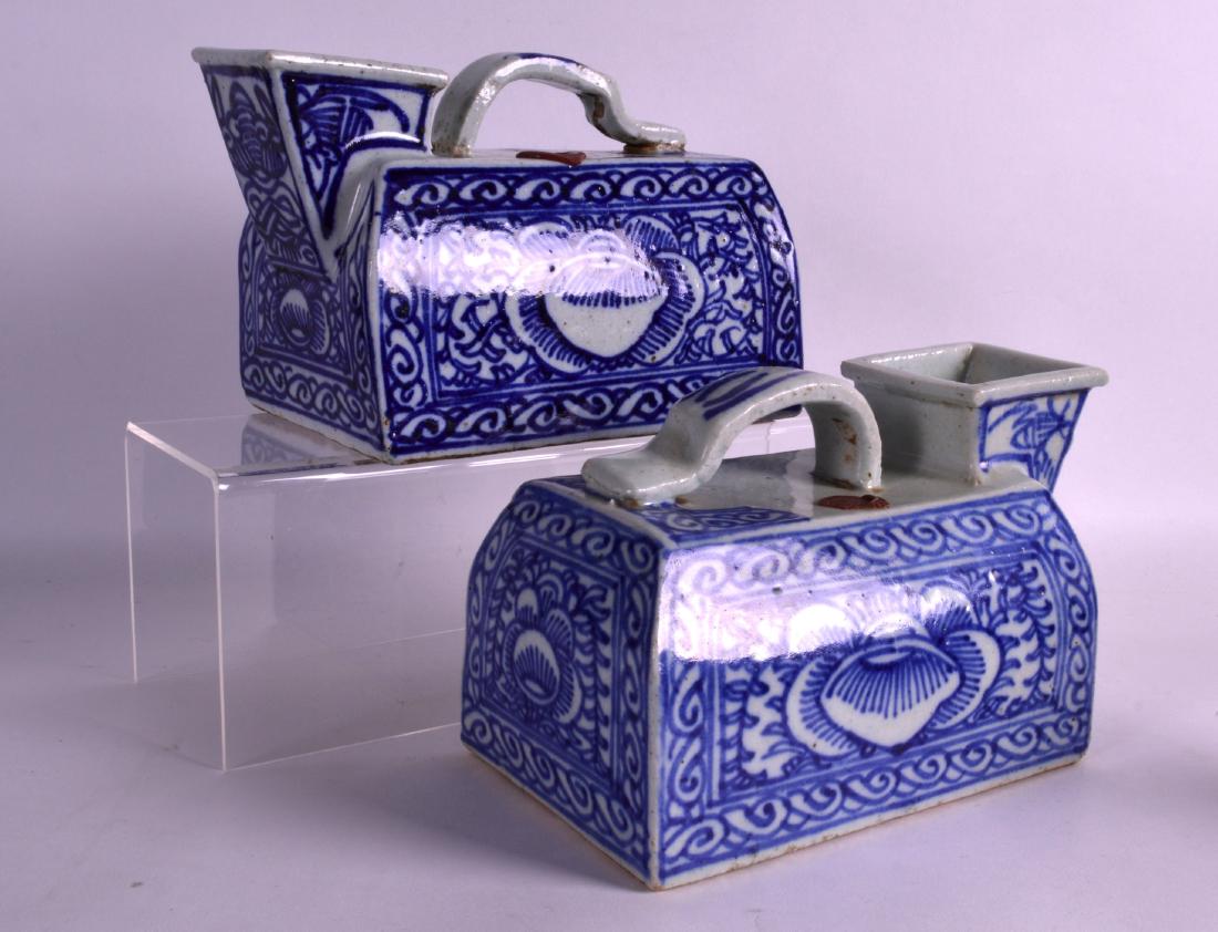 A PAIR OF CHINESE QING DYNASTY BLUE AND WHITE STONEWARE (1 of 2)