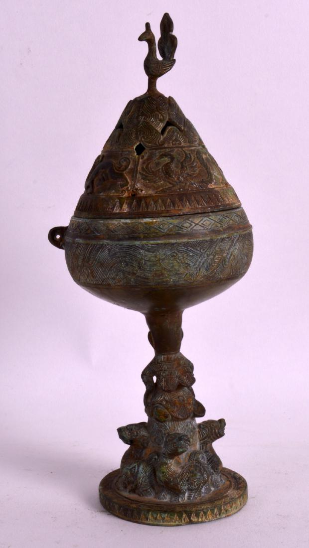 A CHINESE BRONZE INCENSE BURNER AND COVER with figural (1 of 2)