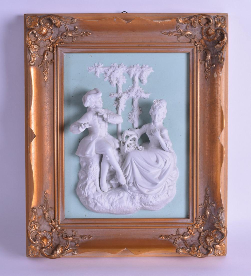 A GILT FRAMED ROCOCO STYLE MEISSEN ART BISQUE PORCELAIN: A GILT FRAMED ROCOCO STYLE MEISSEN ART BISQUE PORCELAIN decorated with a scene from the Castle-Park of Sanssouci. Panel 25 cm x 19 cm.