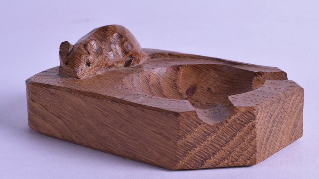 A ROBERT THOMAS MOUSEMAN CARVED WOOD ASHTRAY. 9.75 cm: A ROBERT THOMAS MOUSEMAN CARVED WOOD ASHTRAY. 9.75 cm wide.