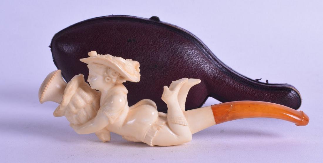 A VICTORIAN CARVED MEERSCHAUM AND AMBER PIPE in the (1 of 1)