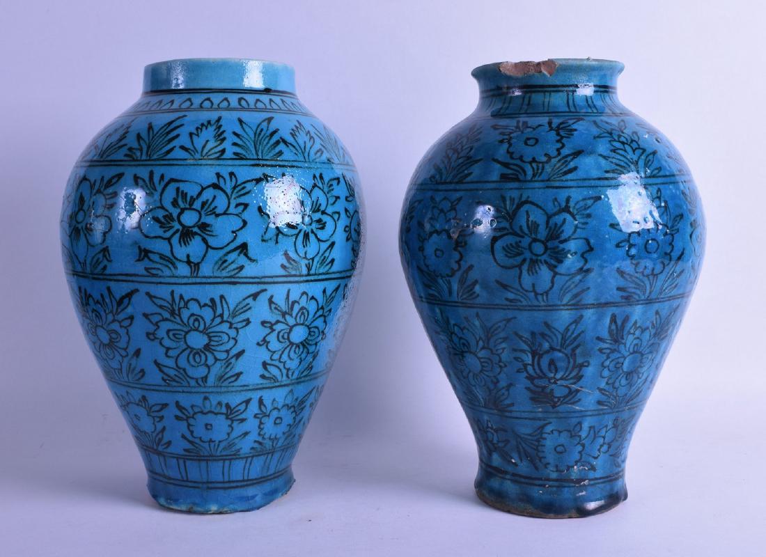 A PAIR OF PERSIAN BLUE GLAZED BALUSTER VASES painted (1 of 1)