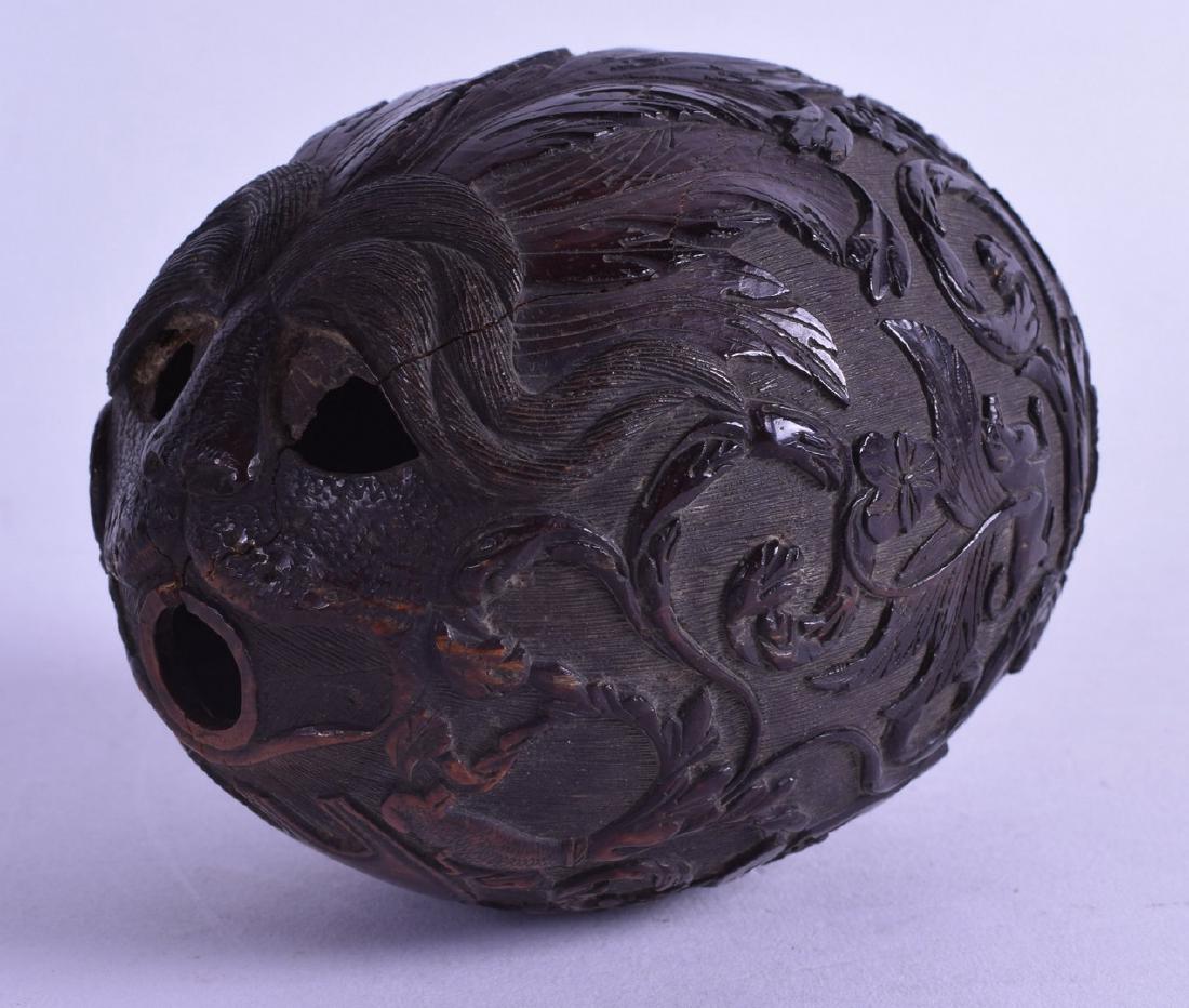 A GOOD EARLY 19TH CENTURY CARVED COCONUT SHELL in the (1 of 1)