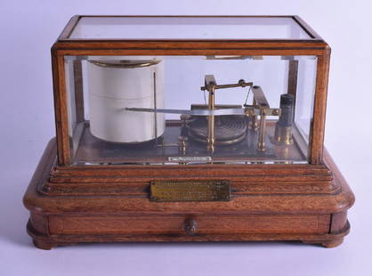 A LARGE ANTIQUE THOMAS ARMSTRONG & BROTHER NO 1683 OAK: A LARGE ANTIQUE THOMAS ARMSTRONG & BROTHER NO 1683 OAK CASED BAROGRAPH with inset brass plaque. 38 cm wide.