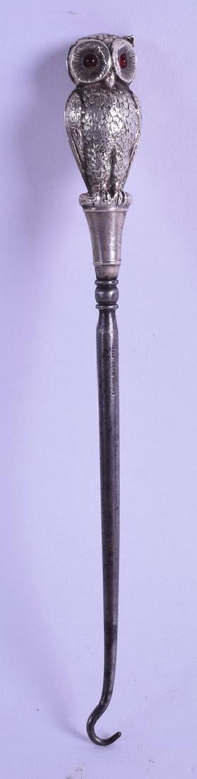 A LOVELY SILVER RUBY EYED NOVELTY BUTTON HOOK in the (1 of 1)