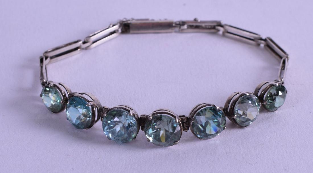 AN ANTIQUE WHITE GOLD MOUNTED AQUAMARINE BRACELET. (1 of 1)