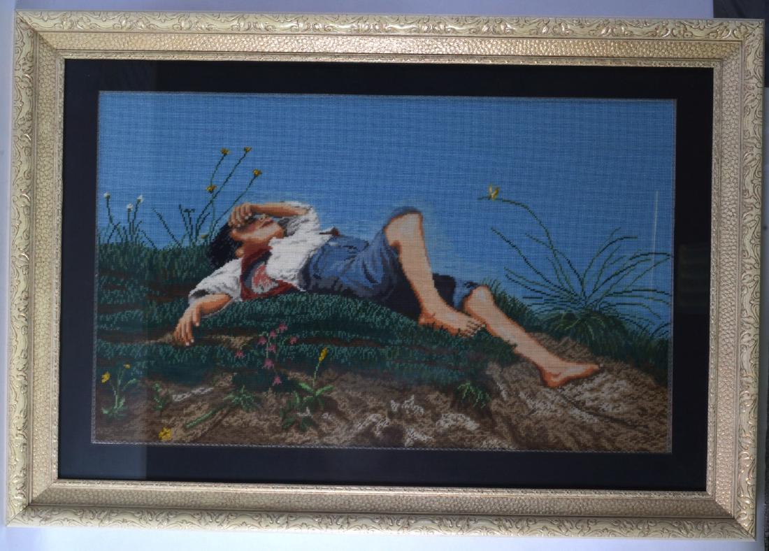 A LARGE FRAMED CANADIAN NEEDLWORK STUDY OF A YOUNG BOY (1 of 1)