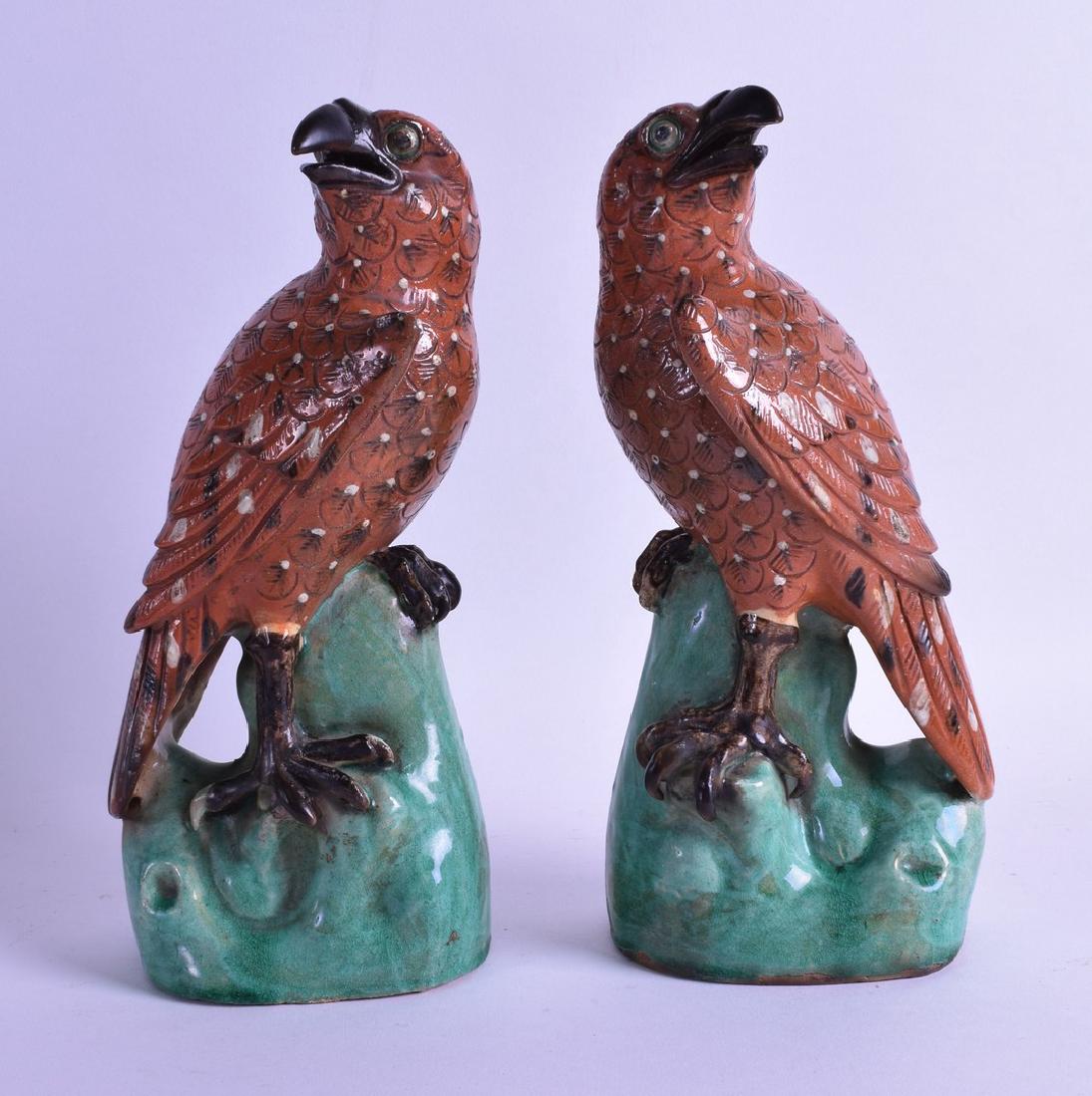 A PAIR OF CHINESE EXPORT QING DYNASTY FIGURES OF HAWKS (1 of 2)