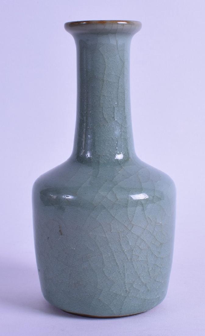 A CHINESE CELADON STYLE MALLET VASE bearing Yongzheng: A CHINESE CELADON STYLE MALLET VASE bearing Yongzheng marks to base. 17.5ins high.