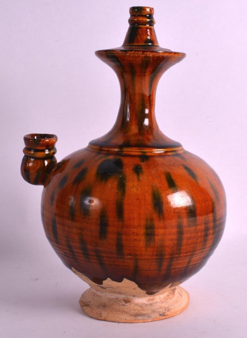 AN EARLY CHINESE SPINACH AND EGG GLAZED POTTERY EWER (1 of 2)
