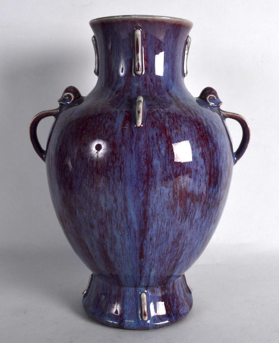 A CHINESE TWIN HANDLED FLAMBE GLAZED PORCELAIN VASE (1 of 3)