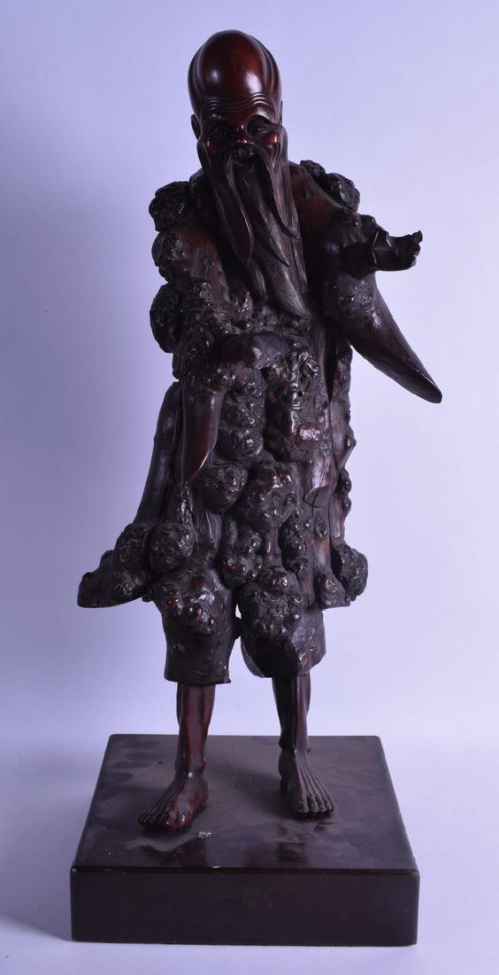 A LARGE 19TH CENTURY CHINESE CARVED ROOTWOOD FIGURE OF (1 of 2)