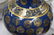 A CHINESE BLUE AND GILT GROUND PORCELAIN VASE bearing - 5