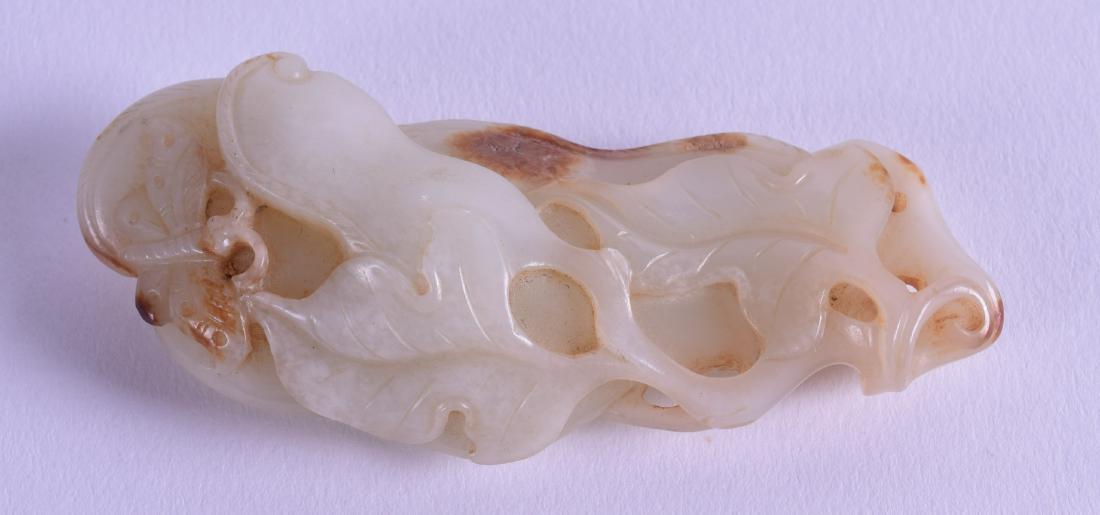 A CHINESE CARVED WHITE JADE NATURALISTIC GROUP mounted (1 of 2)