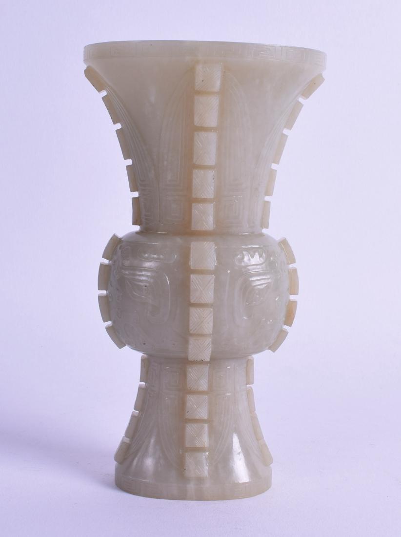 A CHINESE QING DYNASTY CARVED MUTTON JADE GU SHAPED (1 of 2)