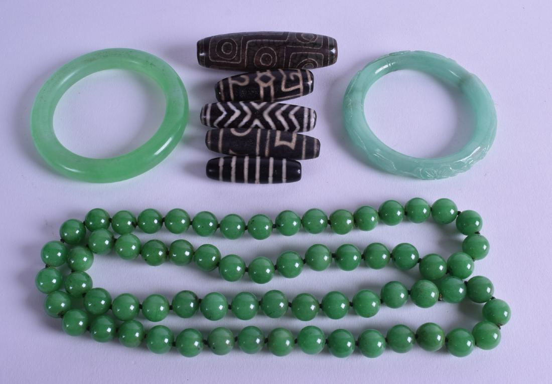 A CHINESE CARVED GREEN HARDSTONE NECKLACE together with (1 of 2)