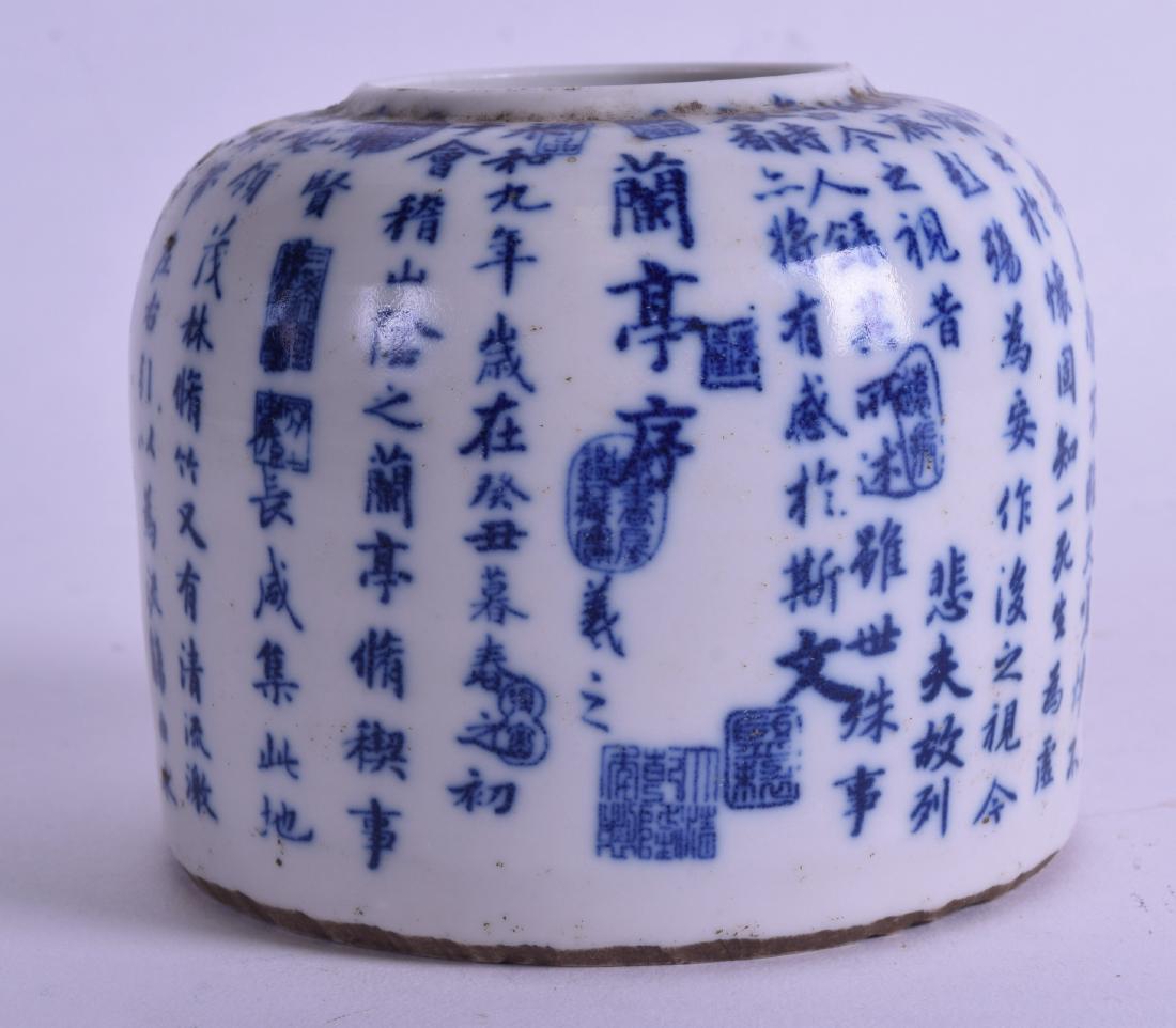 A CHINESE BLUE AND WHITE BRUSH WASHER painted with: A CHINESE BLUE AND WHITE BRUSH WASHER painted with extensive calligraphy. 10 cm wide.