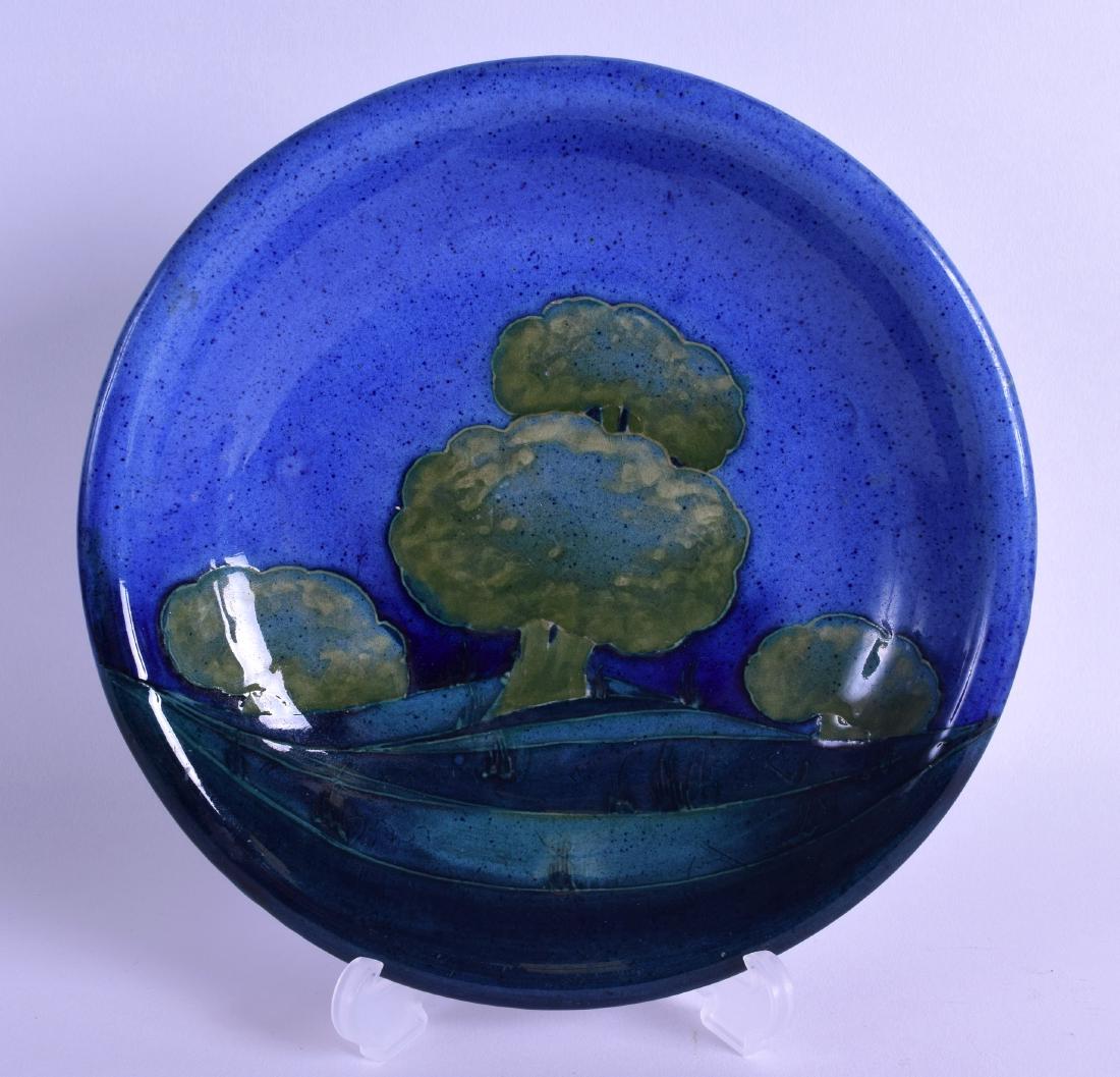A LOVELY MOORCROFT 'MOONLIT BLUE' PLATE C1925. 18.5 cm: A LOVELY MOORCROFT 'MOONLIT BLUE' PLATE C1925. 18.5 cm diameter.