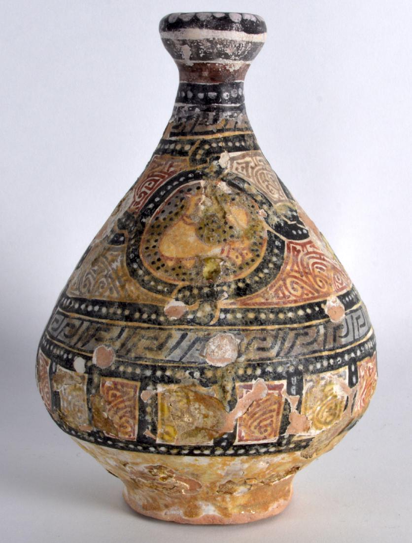 A Good 12th Century Central Asian pottery vase, painted: A Good 12th Century Central Asian pottery vase, painted with geometric motifs etc. 6.75ins high.