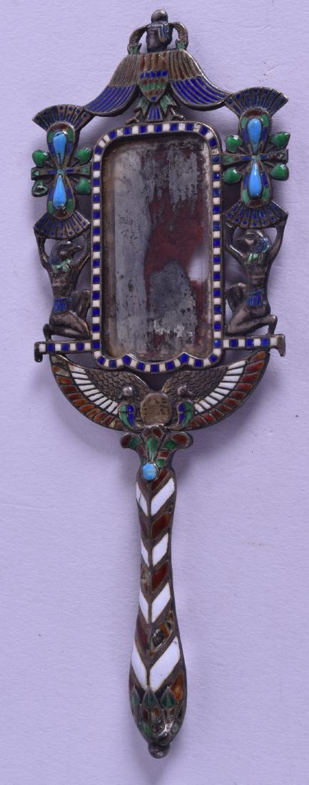 AN UNUSUAL LATE 19TH CENTURY CONTINENTAL SILVER AND: AN UNUSUAL LATE 19TH CENTURY CONTINENTAL SILVER AND ENAMEL HAND MIRROR in the Egyptian Revival taste. 1.4 oz. 13.5 cm long.
