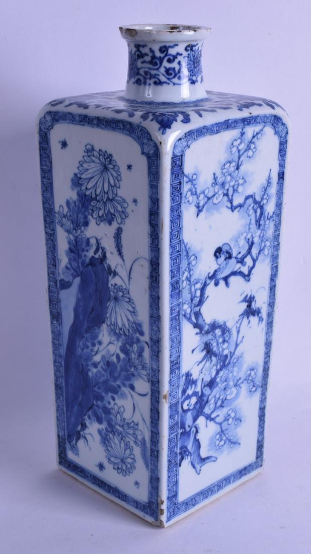 A FINE 17TH/18TH CENTURY CHINESE BLUE AND WHITE SQUARE: A FINE 17TH/18TH CENTURY CHINESE BLUE AND WHITE SQUARE FORM VASE Kangxi/Yongzheng, painted with birds, flowering rock and extensive foliage. 29.5 cm high.