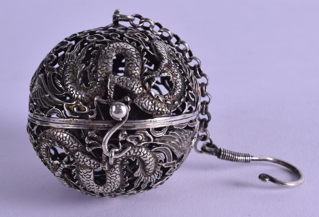 A CHINESE WHITE METAL TRAVELLING OPENWORK CENSER (1 of 3)