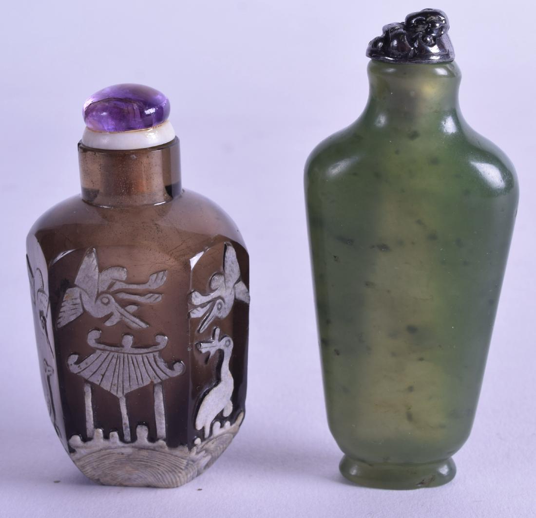 TWO 19TH CENTURY CHINESE SNUFF BOTTLES AND STOPPERS. (1 of 2)