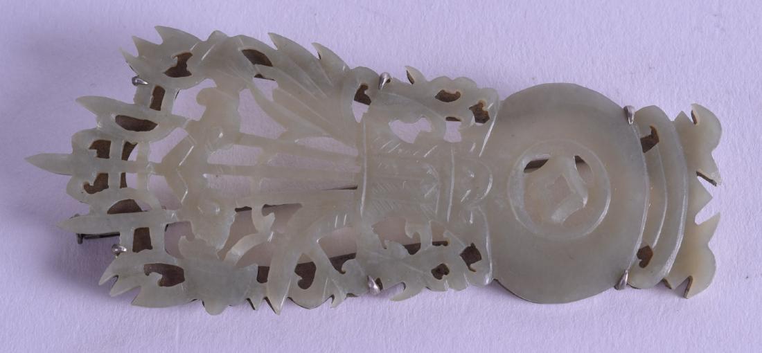 A 19TH CENTURY CHINESE CARVED JADE BROOCH in the form (1 of 2)