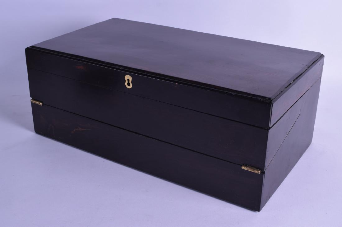 A MID VICTORIAN COROMANDEL RECTANGULAR WRITING BOX with: A MID VICTORIAN COROMANDEL RECTANGULAR WRITING BOX with various hidden compartments. 41 cm wide.