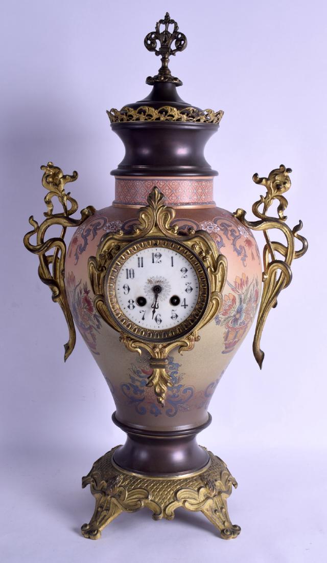 A LATE VICTORIAN CONTINENTAL TWIN HANDLED POTTERY CLOCK (1 of 2)