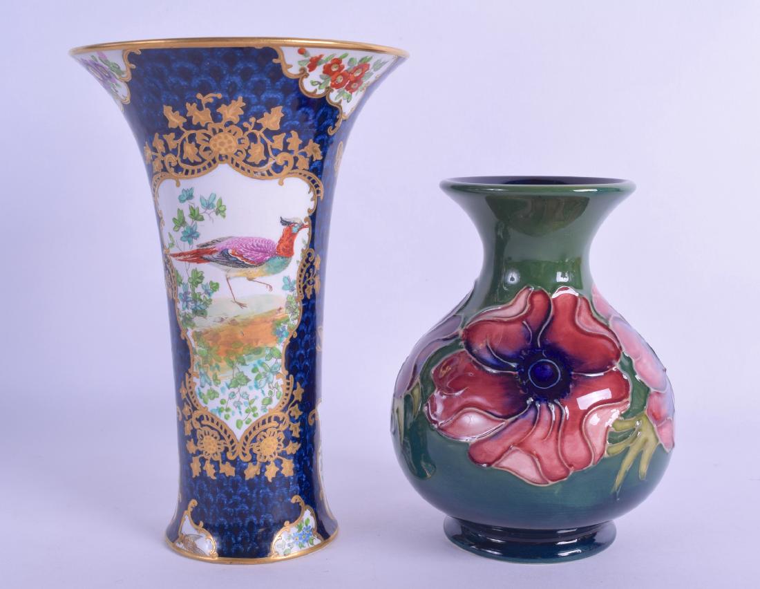 A WALTER MOORCROFT BULBOUS VASE together with a Booths: A WALTER MOORCROFT BULBOUS VASE together with a Booths blue scale vase. 13 cm & 17 cm high. (2)