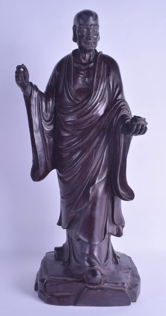 A LARGE CHINESE CARVED HARDWOOD FIGURE OF LUOHAN (1 of 2)