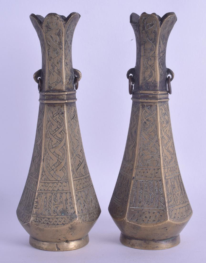 A PAIR OF 19TH CENTURY MIDDLE EASTERN BRASS VASES (1 of 3)