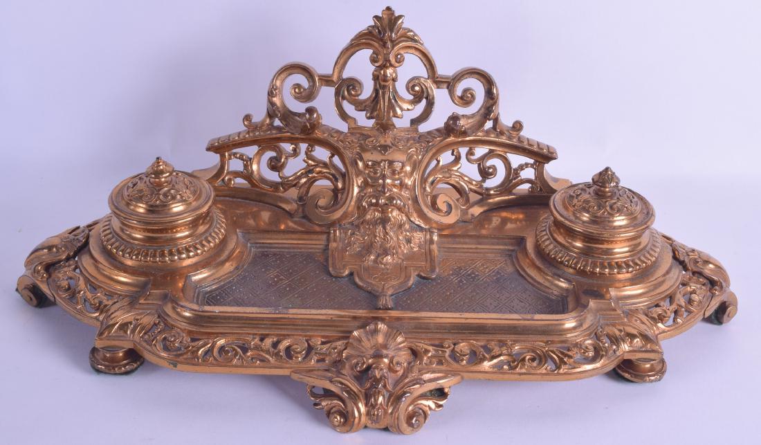 A LATE 19TH CENTURY FRENCH BRASS DESK STAND decorated (1 of 1)