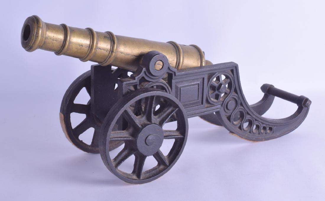 A LATE VICTORIAN BRASS AND CAST IRON SIGNAL CANNON. 42: A LATE VICTORIAN BRASS AND CAST IRON SIGNAL CANNON. 42 cm x 26 cm.
