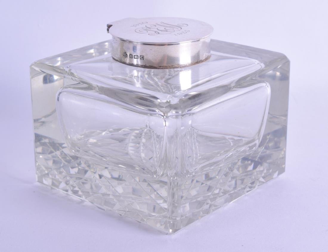 AN ART DECO SILVER TOPPED GLASS DESK INKWELL. (1 of 2)