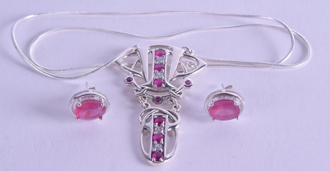 A PAIR OF SILVER AND RUBY EARRINGS together with (1 of 1)