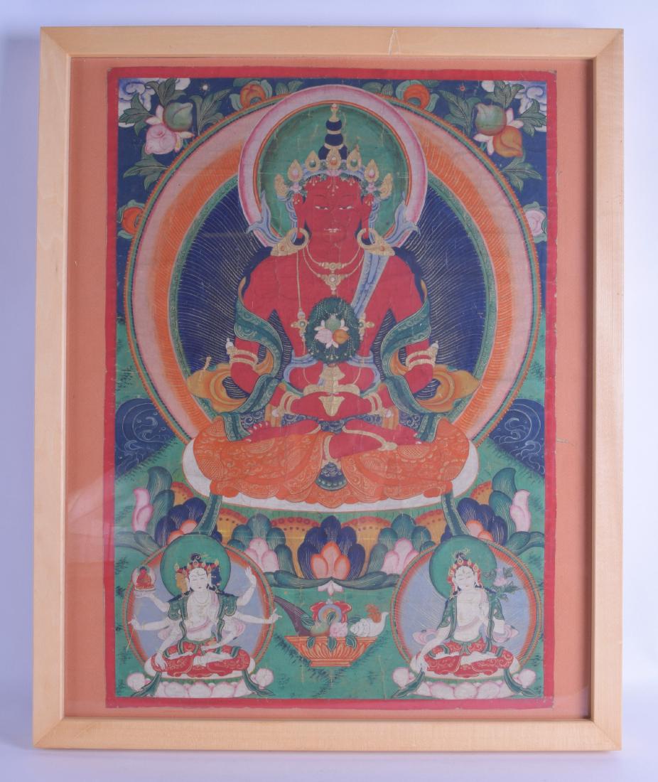 A 19TH CENTURY SINO TIBETAN FRAMED THANGKA depicting a (1 of 3)