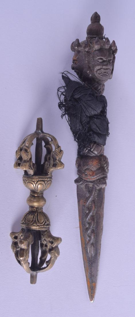 A 19TH CENTURY TIBETAN BRONZE PHURBA with buddhistic (1 of 2)