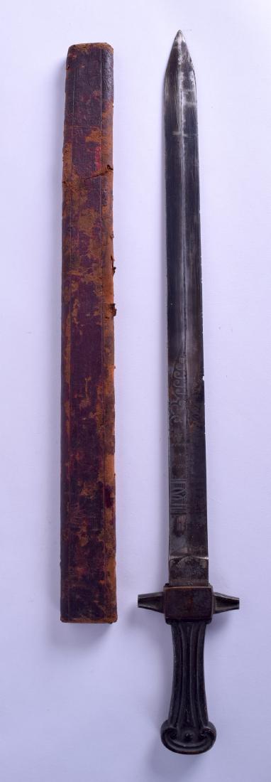 AN UNUSUAL ANTIQUE BRONZE HANDLED SWORD with decoration (1 of 3)