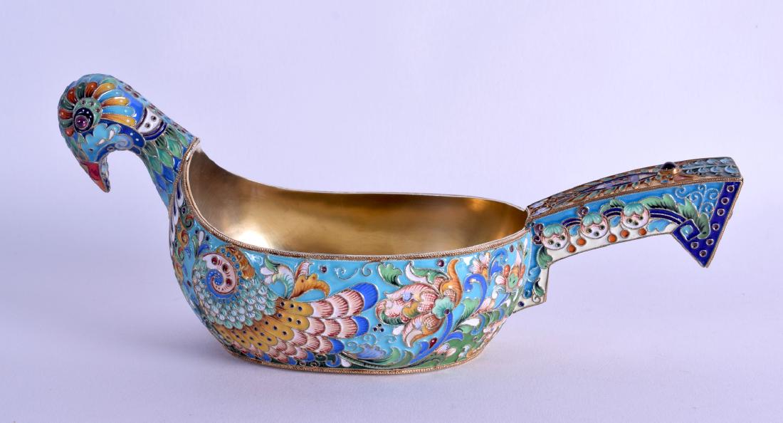 A RUSSIAN SILVER AND ENAMEL KOVSCH in the form of a (1 of 3)